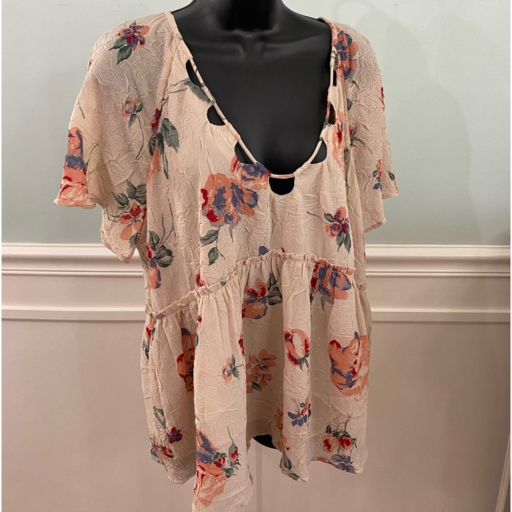 Lucky Brand floral blouse with cutouts in the front.
